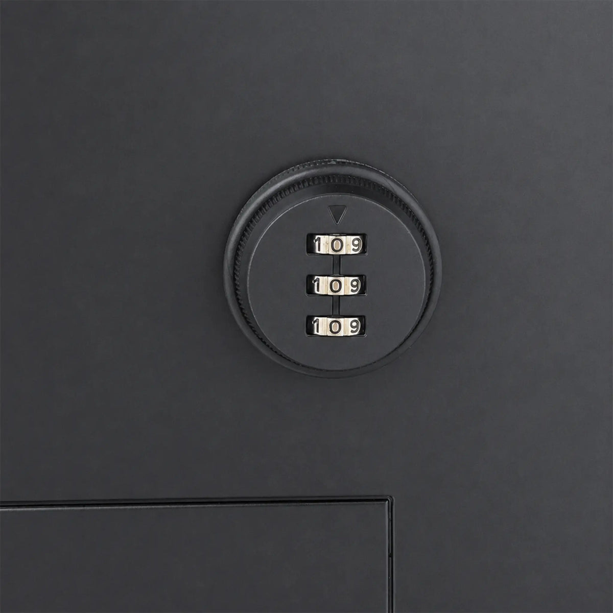 Close up of the combination lock on. the front of the Urbanite Living Finch Parcel Letterbox for installation into walls, brick, freestanding pillars and timber fences.