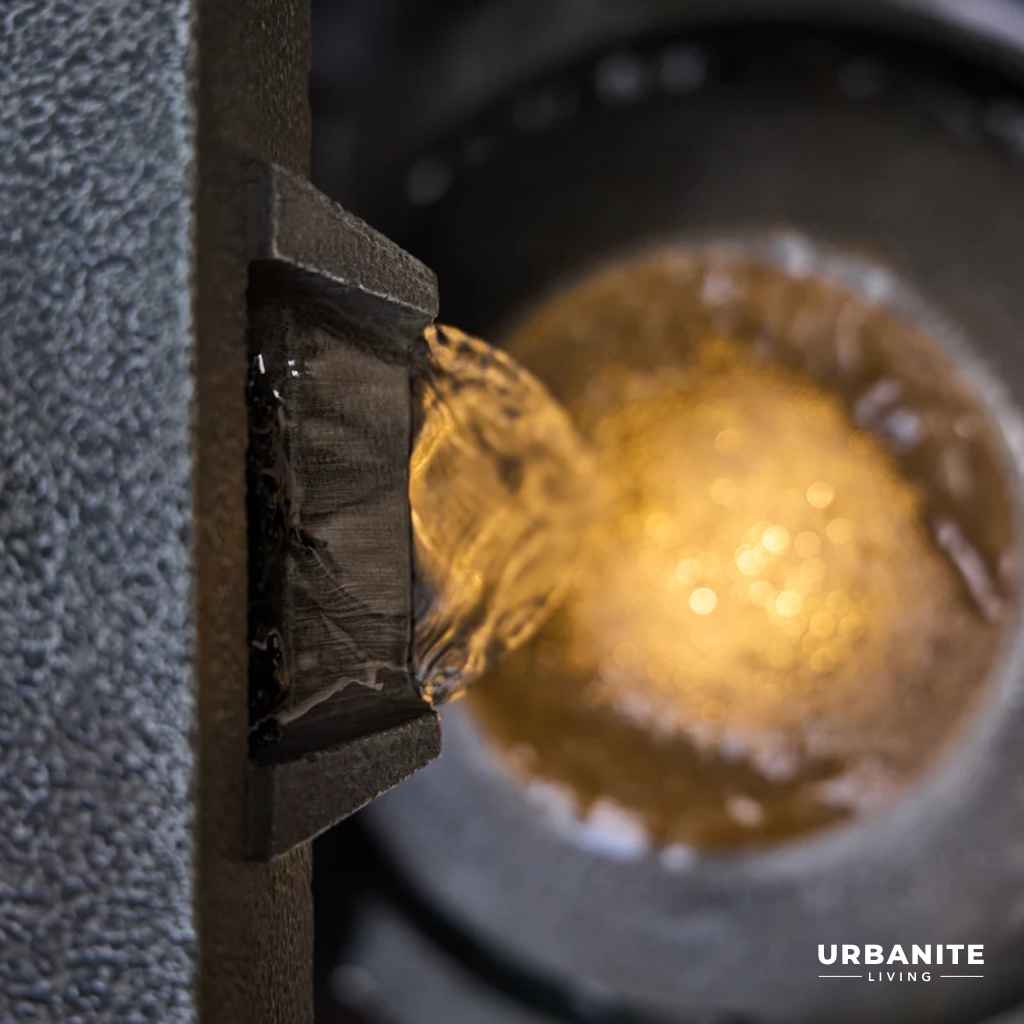 Water fall from the spout to the bowl Lumos Water Feature at Urbanite Living