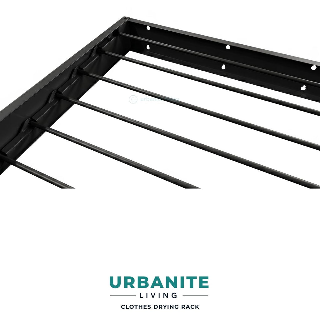Close up view of black foldable wall mounted drying rack frame and hanging lines by Urbanite Living.
